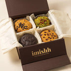 Box of assorted cookies with 'imishh' branding on a light background